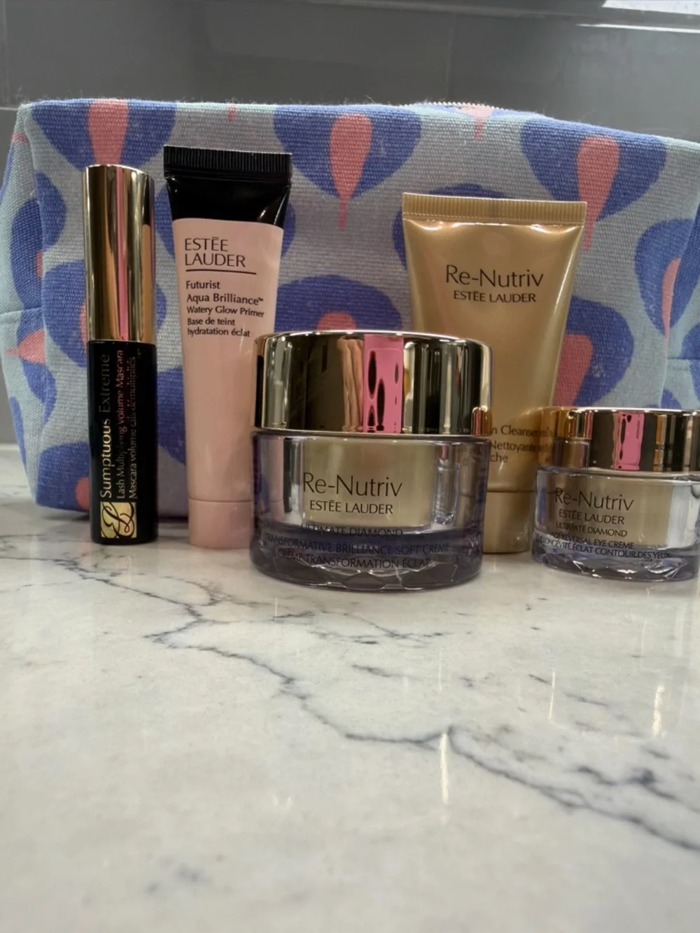 Estee Lauder Skincare Set in Purple and Gold with Pink Primer - Picture 2 of 3